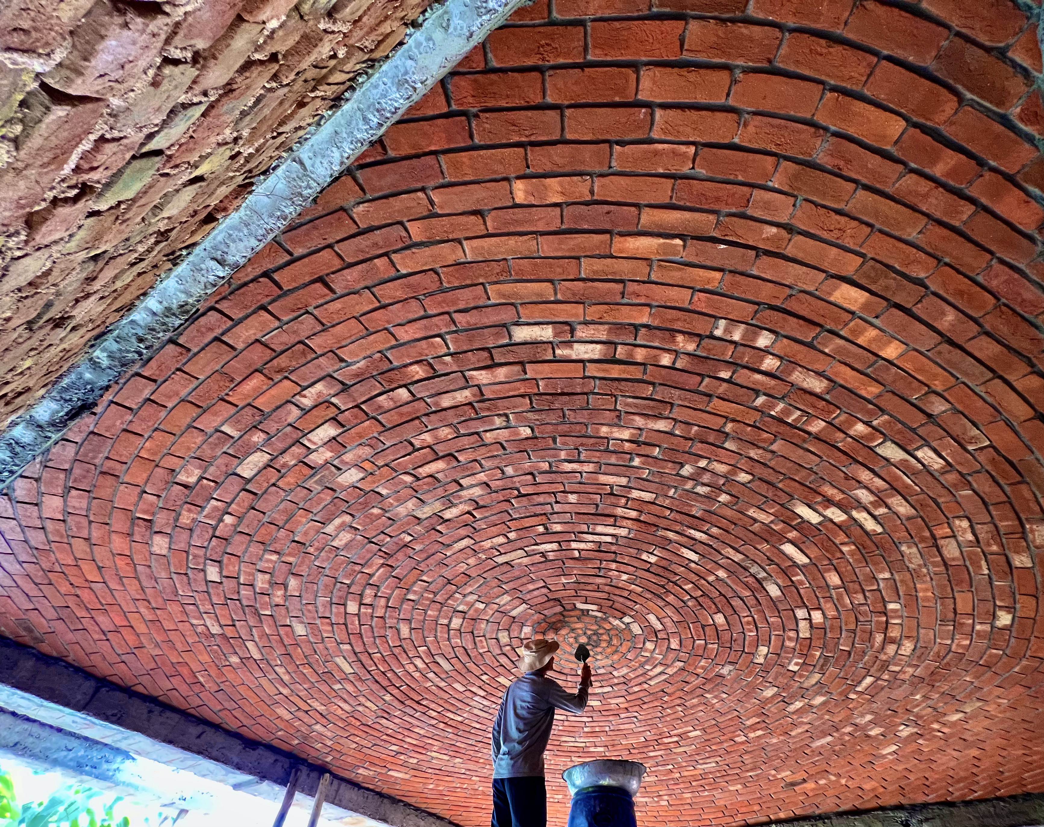 Large circular dome ceiling with radial brick pattern under construction - Rohtak Domes 2025